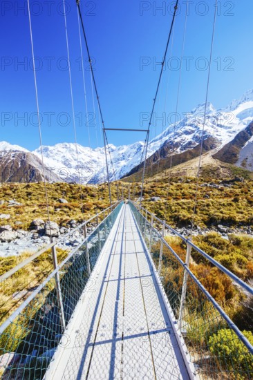 The iconic half day world famous Hooker Valley Track hike at Mt Cook in New Zealand