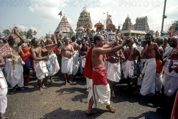 Procession of the bhajan troupe procession around Mahamakham tank during Mahamakham Mahamaham Mahamagam festival in Kumbakonam, Tamil Nadu, India, Asia