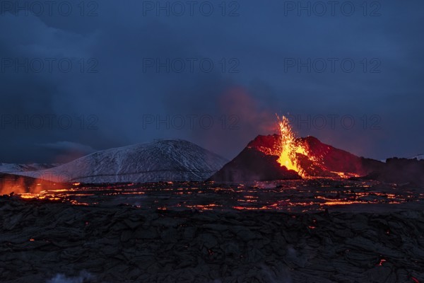 Fagradalsfjall volcanic eruption at night in Reykjanes peninsula around 40 kilometres from Reykjavik, Iceland, Europe