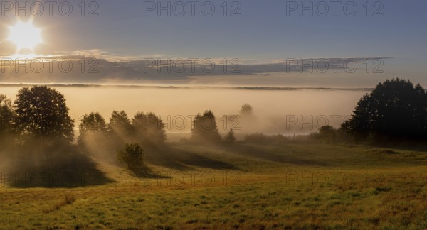 Sunrise on the Biebrza River in the Biebrza National Park. Burzyn, Podlasie, Poland, Europe