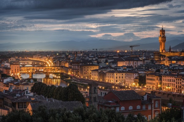 FLORENCE, TUSCANY/ITALY, OCTOBER 18 : Distant view of Palazzo Vecchio at dusk in Florence on October 18, 2019