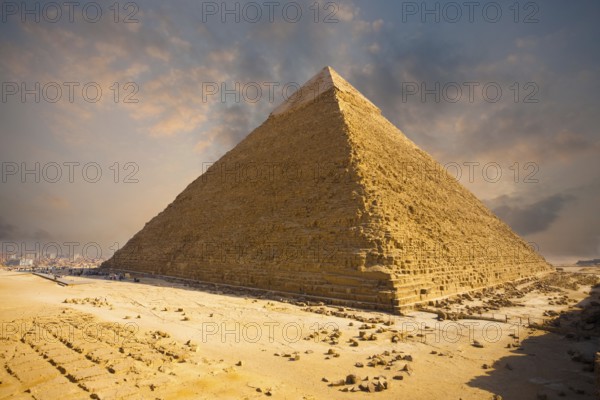 A beautiful fiery sky behind the Giza pyramid of Khafre in Cairo, Egypt, Africa