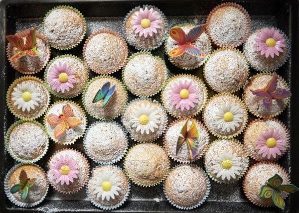 Fresh tasty muffins with decoration
