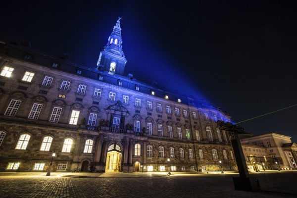 Copenhagen, Denmark, February 15, 2019: The seat of the Danish parliament Christiansborg Palace illuminated for the Light Festival 2019, Europe