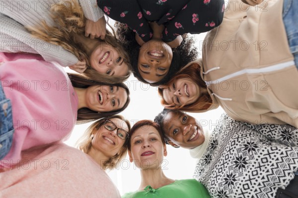 low angle best friends looking down. High resolution photo