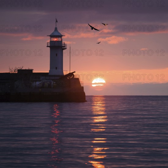 Lighthouse on sunrise. Yalta, Crimea, Ukraine, Europe