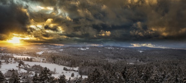 Sunset over the snowy winter landscape near Neuschönau, Bavaria, Germany, Europe