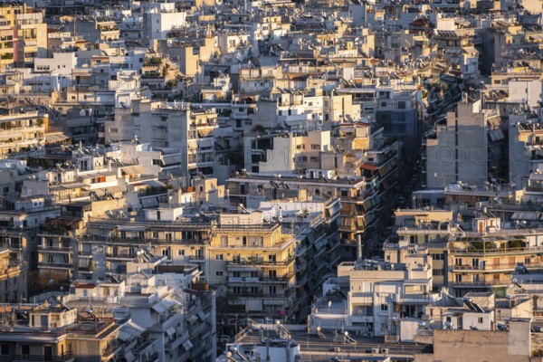 View over houses of Athens in the evening light, Athens, Attica, Greece, Europe