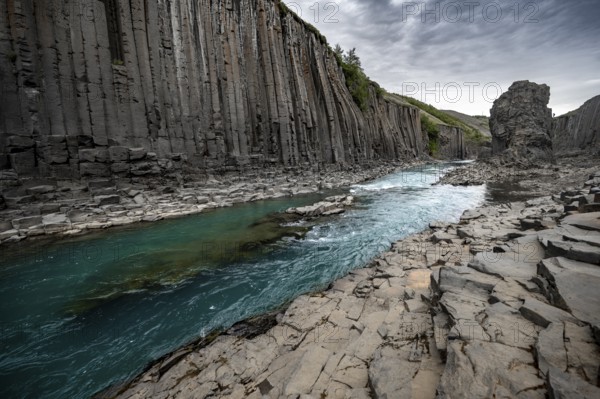 Stuðlagil Canyon, turquoise river between basalt columns, Egilsstadir, Iceland, Europe