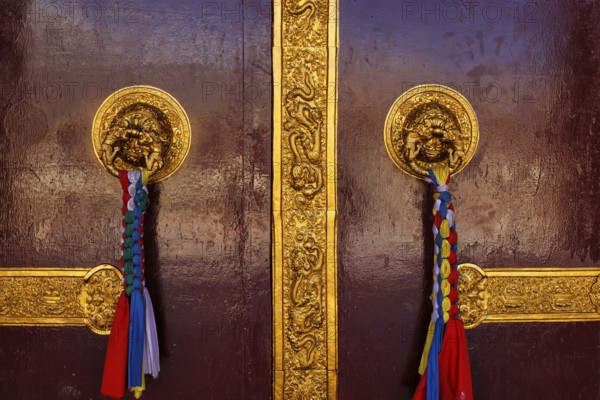 Door handles in Buddhist monastery gompa. Mud village, Pin Valley, Himachal Pradesh, India, Asia