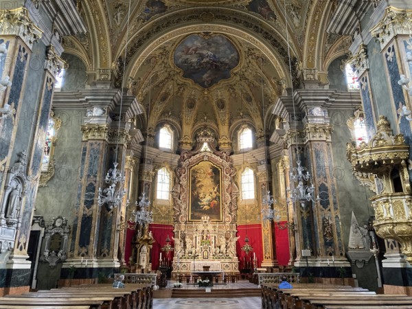 View from interior central nave nave to apse with altar of Bressanone Cathedral Brixen Cathedral Episcopal Church of the Assumption of the Blessed Virgin Mary and St. Cassian in Baroque style Baroque architecture, Bressanone, South Tyrol, Alto Adige, Italy, Europe
