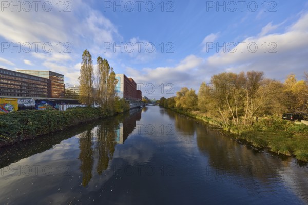 General architecture, trees, canal to the flood basin, blue sky with nimbostratus and cumulus clouds, symmetrical reflections on the water surface, Bullerdeich, Free and Hanseatic City of Hamburg, Hanseatic city, independent city, federal state of Hamburg, Germany, Europe