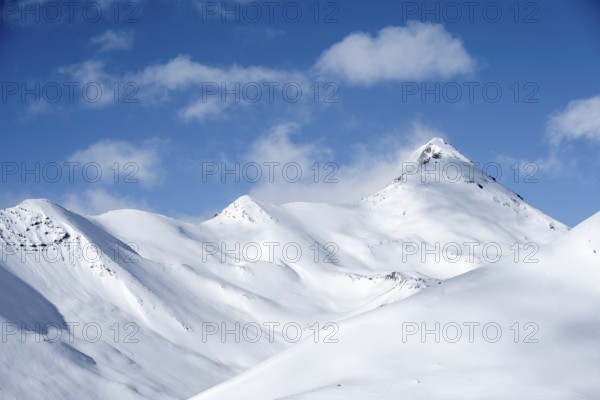 Snow-covered Alps, winter landscape in the mountains, Albula Alps, Grisons, Switzerland, Europe