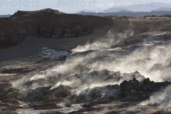 Steam evaporating of the ground at Gunnuhver, close to Reykjanes lighthouse. Gunnuhver is the heart in a future geopark, Iceland´s largest mud pool, geothermal area