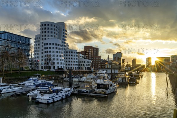 Gehry buildings - Neuer Zollhof at the Media Harbour in Düsseldorf at sunset, North Rhine-Westphalia, Germany, Europe