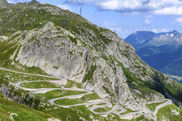 Steep mountain slope in the Gotthard massif, in the foreground serpentines hairpin bends winding mountain road Alpine pass section of historic Gotthard Pass Saint Gotthard Passo San Gottardo Tremola with cobblestones, Airolo, Ticino, Canton Ticino, Switzerland, Europe
