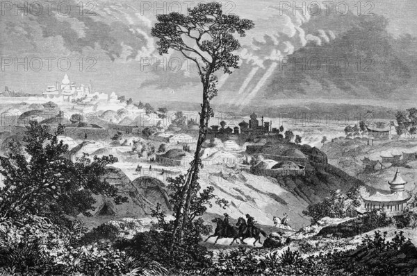 Mountainous landscape around Urga, today's Ulaanbaatar or Ulan Bator, city complex on a slope, capital, temple, round tents, horsemen, travelling in Asia, Mongolia, historical illustration 1887, Asia
