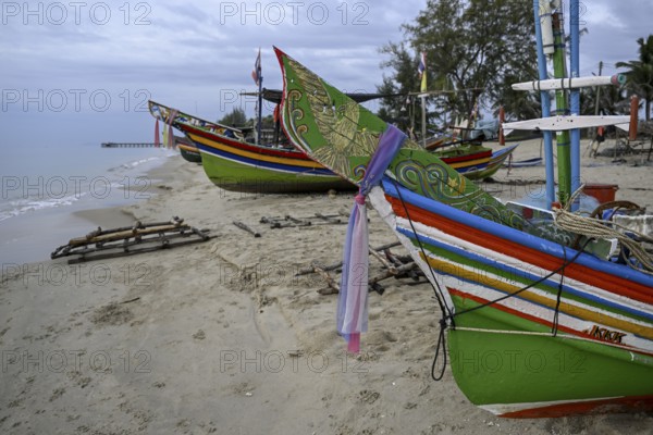 Fishing boats on the beach of Chathing Phra, near Hat Yai, Songkhla province, Thailand, Asia