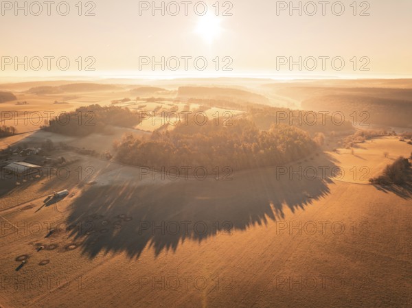 Sunny scenery from a bird's eye view over fields and hills with soft lighting, Gechingen district of Calw, Black Forest, Germany, Europe