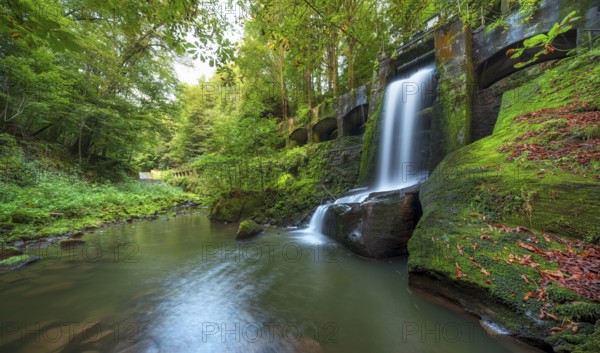 Waterfall at the historic Niezelgrund hydroelectric power station, Lohmen, Saxony, Germany, Europe