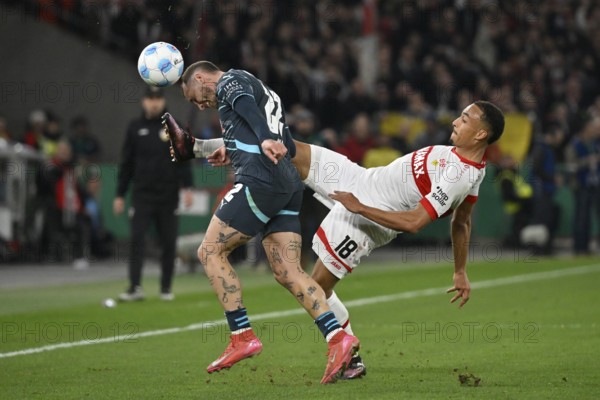 Duel, action Jamie Leweling VfB Stuttgart (18) against David Raum RasenBallsport Leipzig RBL (22) semi-final, DFB Cup, MHPArena, MHP Arena Stuttgart, Baden-Württemberg, Germany, Europe