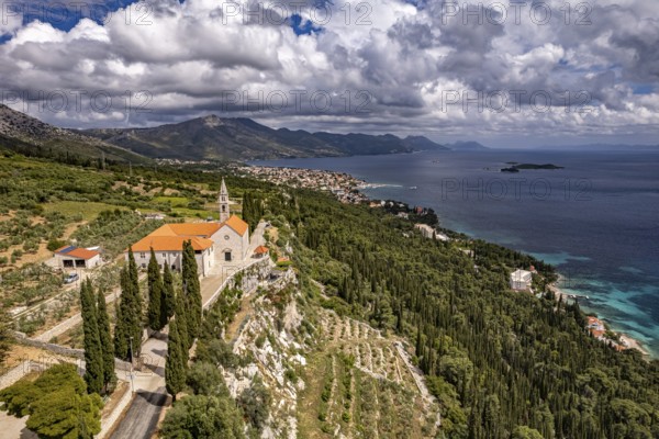Franciscan monastery and church Madonna of the Angels and the coast seen from above, Orebic, Peljesac peninsula, Croatia, Europe