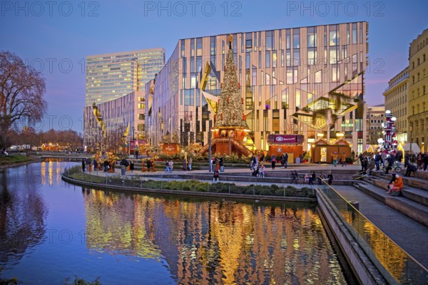 Dreischeibenhaus and Christmas market in front of the Koe-Bogen by architect Daniel Libeskind, Düsseldorf, North Rhine-Westphalia, Germany, Europe