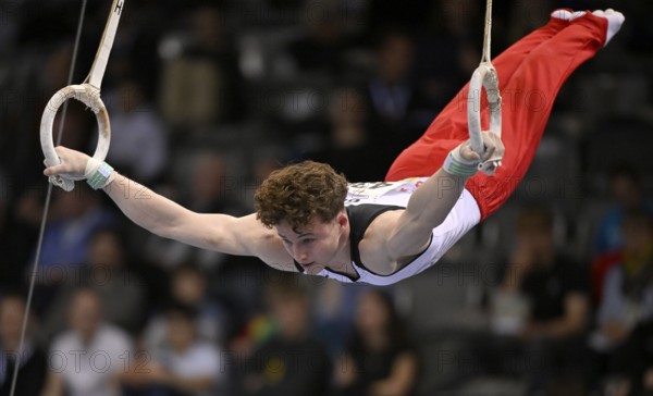 Alexander Kurz GER rings action gymnastics, EnBW DTB-Pokal, Porsche-Arena, Stuttgart, Baden-Württemberg, Germany, Europe
