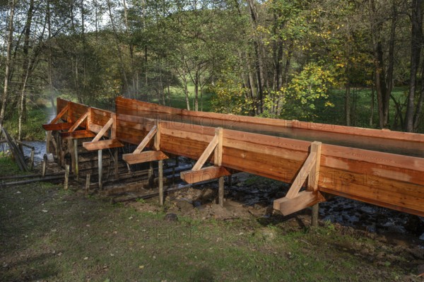 Newly built wooden channel for a stream to drive a mill wheel, Egloffstein, Upper Franconia, Bavaria, Germany, Europe