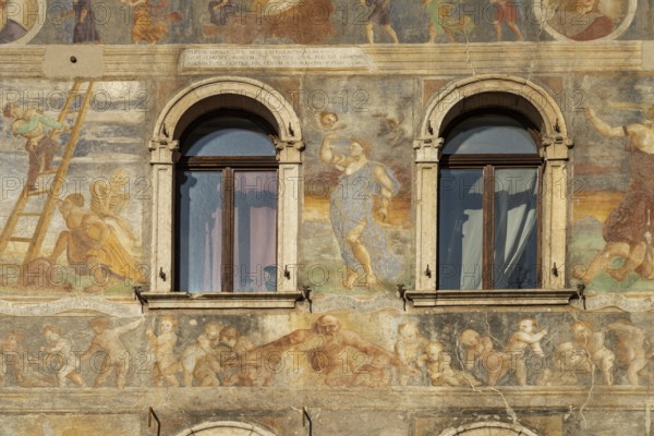 The painted façade of the Case Cazuffi Rella houses on Piazza del Duomo in Trento, Trentino, Italy, Europe