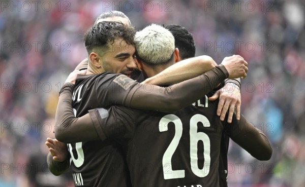 Goal celebration Elias Saad FC St. Pauli (26) Danel Sinani FC St. Pauli (10) Maniolis Saliakas FC St. Pauli (02) Allianz Arena, Munich, Bavaria, Germany, Europe