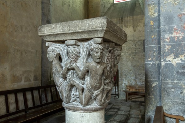 Mozac. The atlantes. Sculptures of Saint-Pierre Abbey Church. Puy de Dome department. Auvergne-Rhone-Alpes. France