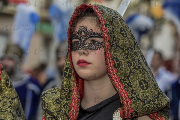 Woman in historic clothes, Moors and Christians Parade, Moros y Cristianos, Jijona or Xixona, Province of Alicante, Costa Blanca, Spain, Europe