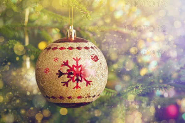 Christmas celebration holiday background, christmas-tree decoration bauble on decorated Christmas tree with defocused blurred lights bokeh and copyspalce