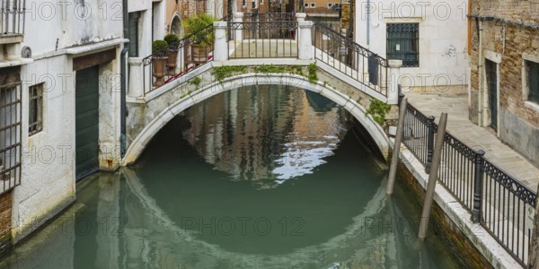 Arched bridge over the old town canal, Venice, Veneto, Italy, Europe