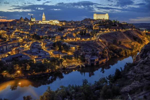 City view of Toledo with the river Tajo, blue hour, province Toledo, region Castilla-La Mancha, Spain, Europe