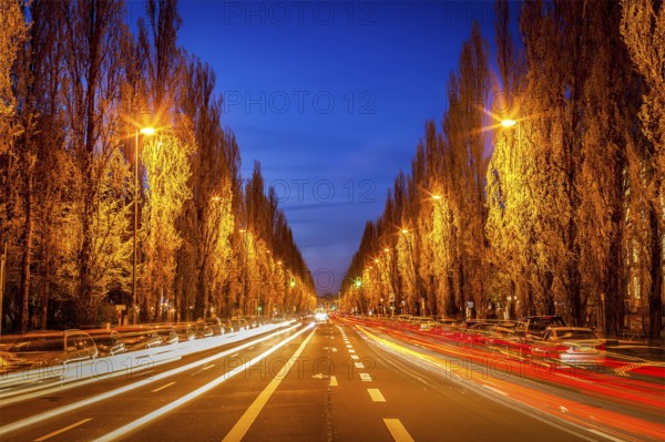 Street road in evening with motion blur. Munich, Germany, Europe
