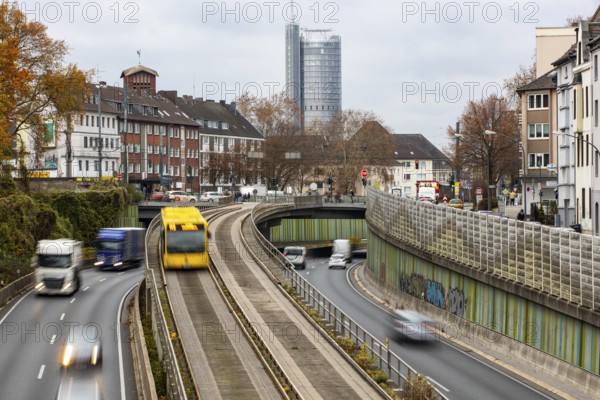 Motorway A40, Ruhrschnellweg, skyline of the city centre of Essen, exit Essen-Huttrop, track bus route, this area would also be affected by a diesel driving ban, Essen, North Rhine-Westphalia, Germany, Europe