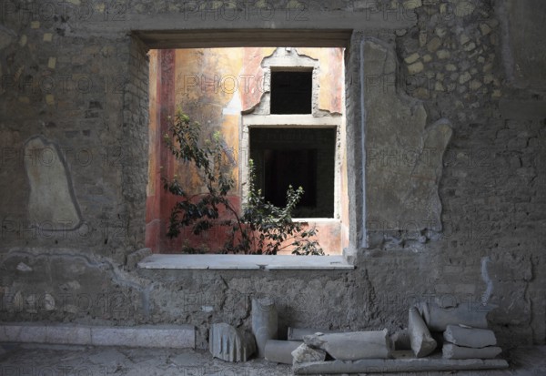 Villa of Poppea, view through window of the remains of the fresco decoration. Historic town of Oplontis, Torre Annunziata, Campania, Italy, Europe
