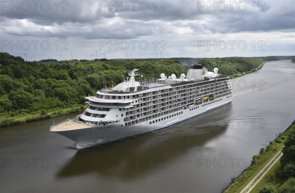 Cruise ship The World on a voyage through the Kiel Canal, Schleswig-Holstein, Germany, Europe