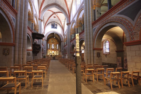 Interior view of the late Romanesque Church of the Assumption of Mary with pulpit and candle, Andernach, Rhineland-Palatinate, Upper Middle Rhine Valley, Germany, Europe