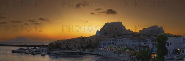 Harbour of the fishing village Finiki at dusk with boats and rocks, fishing village Finiki, Karpathos, Greece, Europe