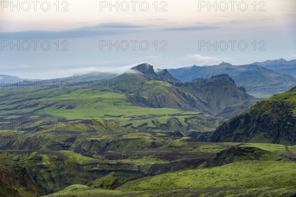 Moss-covered volcanic mountain landscape, Pakgil, Iceland, Europe
