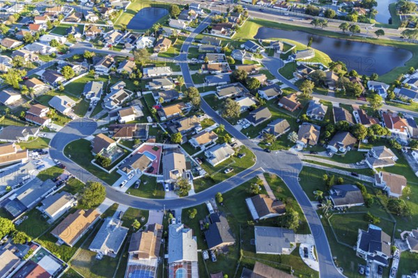 Aerial view of a new housing estate with houses in Buenaventura Lakes, Orlando, USA, North America