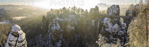 Panorama of Neurathen Castle and the Bastei Bridge on a winter morning, in the background the Lilienstein, Saxon Switzerland, Saxony, Germany, Europe