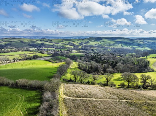 Farms over Road A35 from a drone, Morcombelake Village, Bridport, Dorset, England, United Kingdom, Europe