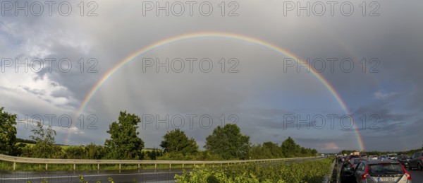 Rainbow over the A14 motorway near Leipzig, Saxony, Germany, Europe