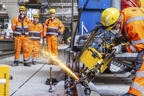 The last rails are being welded at the new main station. All the rails are now in place between Feuerbach and Wendlingen. The last gaps between the rails have been closed using the Thermit welding process. The infrastructure project is scheduled to go online at the end of 2026. Deutsche Bahn estimates the total cost of Stuttgart 21 at around eleven billion euros. Stuttgart, Baden-Württemberg, Germany, Europe