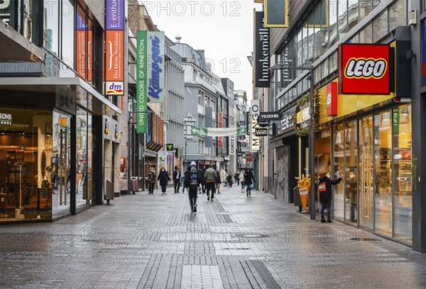 Cologne, North Rhine-Westphalia, Germany - Cologne city centre in times of the corona crisis during the second lockdown, the shops are closed, only a few passers-by stroll along Hohe Straße on Friday afternoon