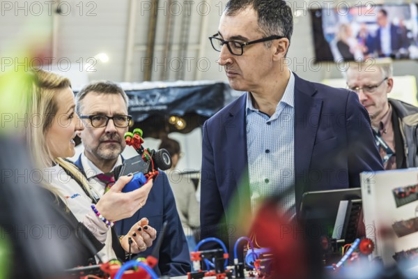 Education Minister Cem Özdemir visits Europe's largest education trade fair in Stuttgart. Here at the fisherman stand with Ann-Christin Walker from the Fischertechnik product division. Didacta 2025 focussed on the key topic of democracy education. Stuttgart, Baden-Württemberg, Germany, Europe